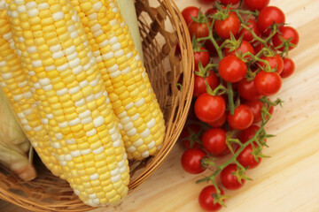 Wall Mural - Corn and Cherry Tomato for Sale at Organic Market