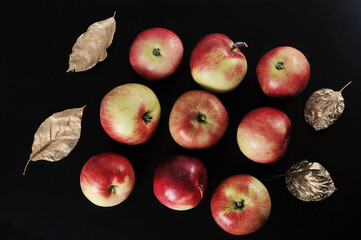 Wall Mural - red ripe apples on black background