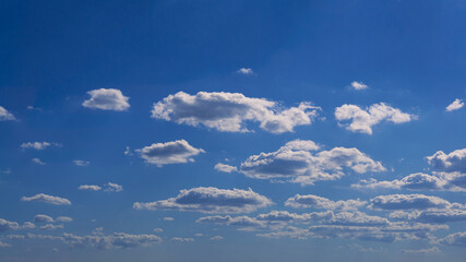 Wall Mural - Cumulus clouds with blue sky on a sunny day of summer. Beautiful cloudscape