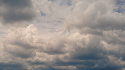 Wall Mural - Cumulus clouds with blue sky on a sunny day of summer. Beautiful cloudscape