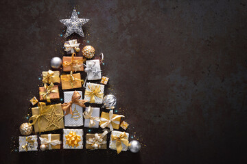 Wall Mural - christmas gift boxes and laid out in the shape of a christmas tree