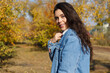 © mikhail_b_azarov - Portrait of young woman walking outdoors in autumn park