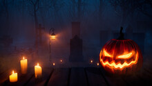 Halloween Illuminated Pumpkin With Candles, In A Ghostly Woodland Churchyard At Night.
