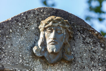 Wall Mural - Stone sculpture of Jesus Christ in the cemetery