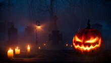 Halloween Scene With Ghostly Moonlit Tombstones And Scary Pumpkin.