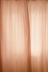 Wall Mural - Window with closed beige curtains close up