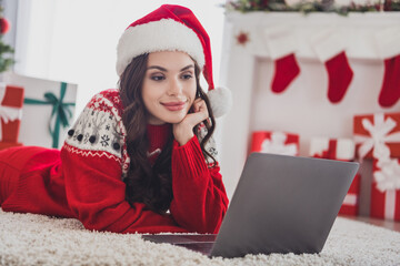 Sticker - Photo portrait thoughtful woman in headwear dreamy laying on floor watching movie on laptop