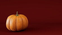 Contemporary Autumn Image With Pumpkin On Dark Red Background.
