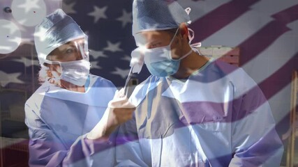 Sticker - Animation of flag of usa waving over surgeons in operating theatre