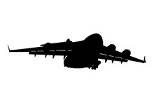 Silhouette of heavy transport aircraft landing