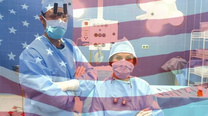 Sticker - Animation of flag of usa waving over surgeons in operating theatre