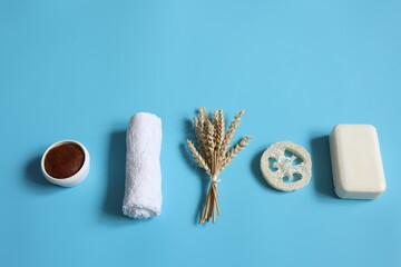 Wall Mural - Spa composition with bath accessories on a blue background, top view.