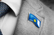 Metal badge with the flag of Kosovo on a suit lapel