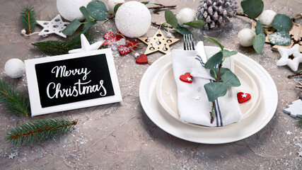 Poster - Christmas white and green table decoration.