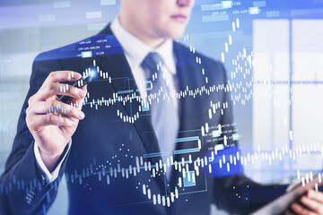 Poster - Businessman wearing formal suit is touching digital screen with