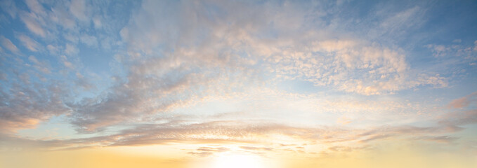 Wall Mural - sunlight, clouds and pastel blue sky background, panoramic angle view sky white cloud and bright sun