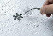 A hand pick a piece of jigsaw puzzle written with General and an empty space of jigsaw puzzle written with Specific.