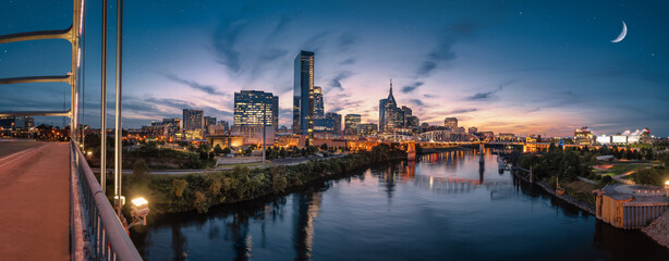Wall Mural - nashville skyline during blue hour with river front