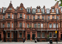 Facade Of English Victorian Style Terraced Townhouses In Chelsea London
