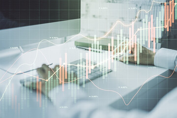  Double exposure of abstract creative financial chart with hand typing on computer keyboard on background, research and strategy concept