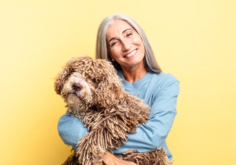 Wall Mural - senior gray hair woman. pet dog concept