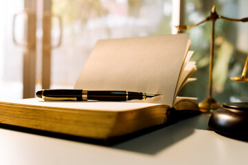 Business and lawyers discussing contract papers with brass scale on desk in office. Law, legal services, advice, justice and law concept picture with film grain effect