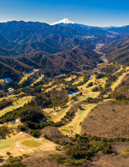 Sticker - Vertical aerial shot of a golf course in Japan during daylight