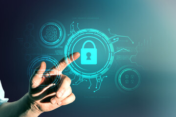 Poster - Male hand pointing at creative glowing blue digital padlock interface on dark background. Online security and safety concept.