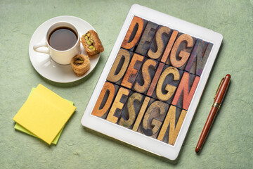 Canvas Print - design - word abstract in vintage wood letterpress block types on a digital tablet with a cup of cof
