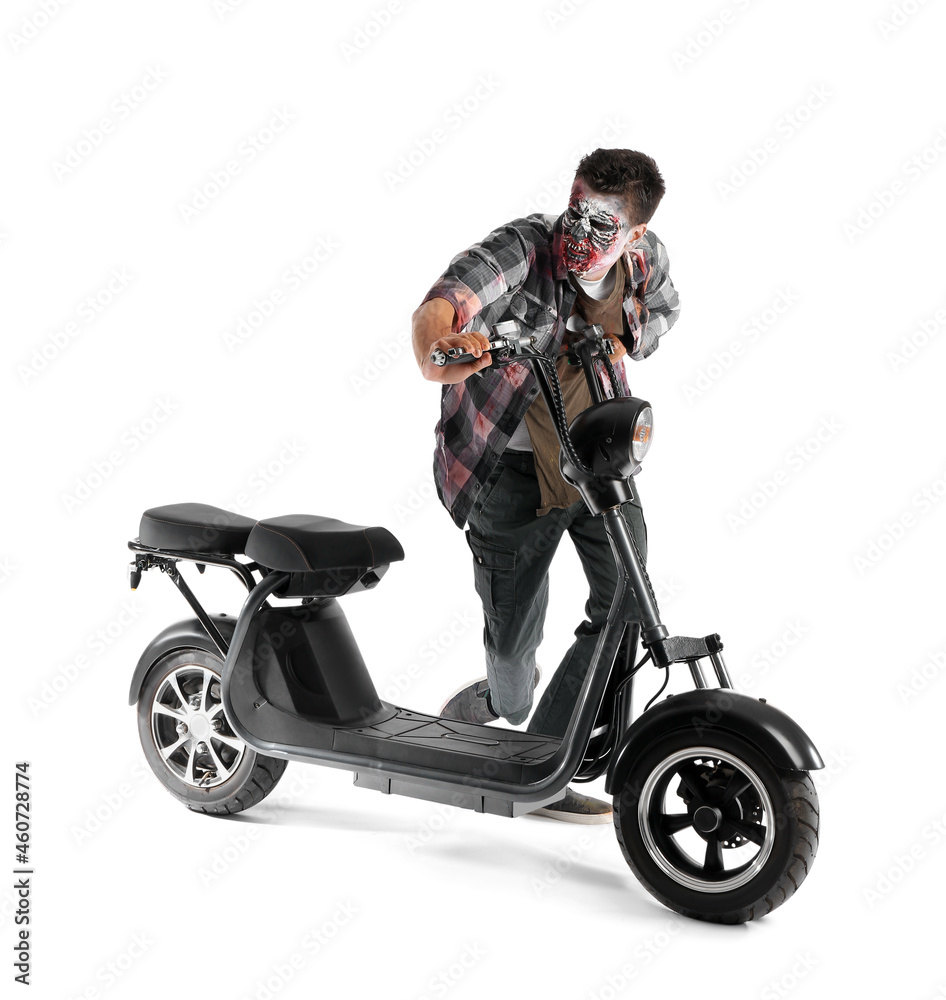 Man dressed for Halloween as zombie with motorcycle on white background
