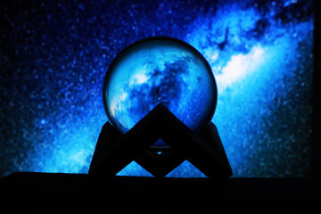 Magic ball predictions. mysterious composition. Fortune teller, mind power, prediction concept. Space inside.