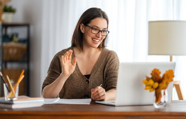 Poster - young woman working at home