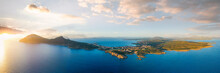 View From Above, Aerial Shot, Stunning Panoramic View Of Golfo Aranci During A Beautiful Sunrise. Golfo Aranci Is A Village That Extends Along A Strip Of Land Into Turquoise Sea. Sardinia, Italy.