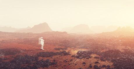 Wall Mural - astronaut doing space walk and explore planet such as mars.