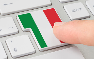 Wall Mural - a keyboard with a labeled button - flag of italy