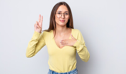 Poster - hispanic pretty woman looking happy, confident and trustworthy, smiling and showing victory sign, with a positive attitude