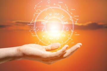 zodiac signs inside of horoscope circle astrology and horoscopes concept on sky background