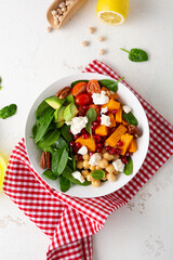 Poster - Butternut pumpkin salad with feta and roasted chickpea healthy food on light surface