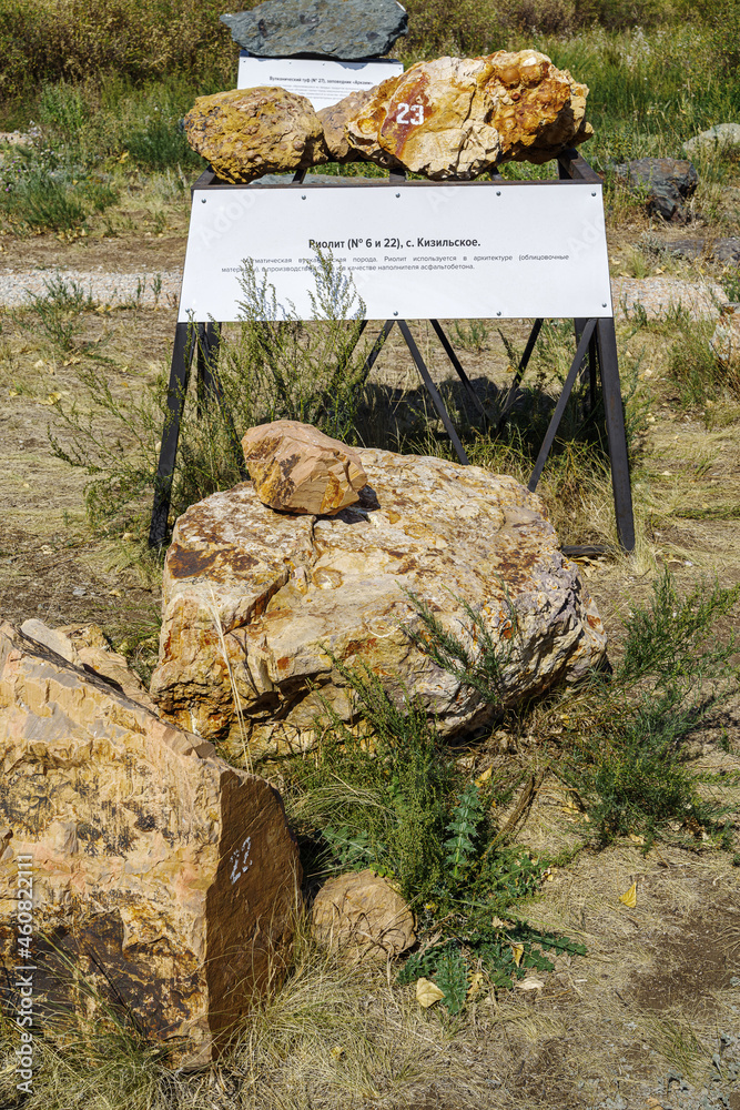 Arkaim, Russia - ACollection of rocks. Inscription on plate: Rhyolite ...