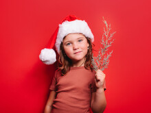 Funny Kid In Xmas Costume In Studio With Opened Mouth