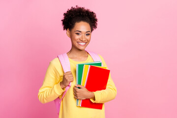 Sticker - Photo of pretty attractive lady wear yellow pullover backpack holding diaries empty space isolated pink color background