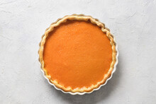 Traditional American Pumpkin Pie Isolated On White Background. View From Above. Homemade Pastry For Thanksgiving Day.