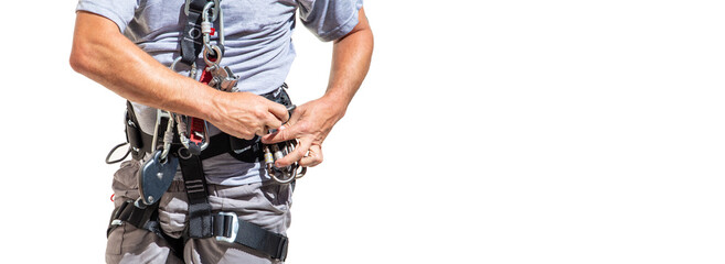 Man with safety equipment at work in the heights. Carabiner, belt, chair for rappel. On white background