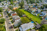 Fototapeta Miasto - Aerial view of small streets residential area a small town in Sayreville New Jersey