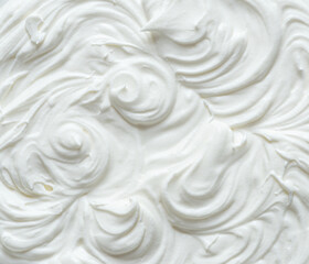  Creamy pics in yoghurt or cream surface. Top view.