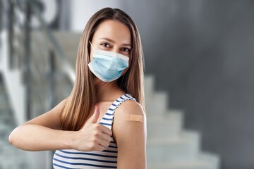 Sticker - Woman happy young with plaster on shoulder after vaccination