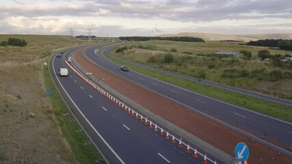 Wall Mural - Traffic moving through roadworks on a major UK dual carriageway (A465 Heads of the Valleys road)
