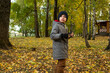 © Zuev Ali - Little boy walks in the autumn park.