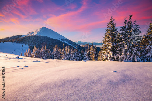 Fototapete - Splendid sunset in the mountains on a frosty evening. Location place of Carpathian mountains, Ukraine, Europe. Picturesque wallpapers. Photo of winter vacation. Happy New Year! Beauty of earth.