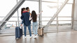 © Prostock-studio - Family Travel. Parents With Little Daughter Standing At Airport Terminal, Rear View